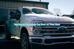 A roofer's truck is covered in ice