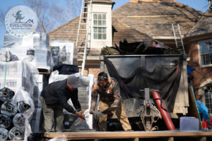 A new Cedar Shake roof is being installed