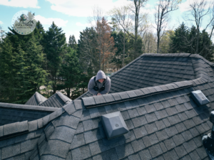 A roofing specialist conducts a complimentary inspection